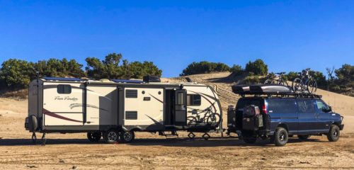 Travel trailer boondocking in the wild with RV steps pulled out Travel trailer boondocking in the wild with RV steps pulled out