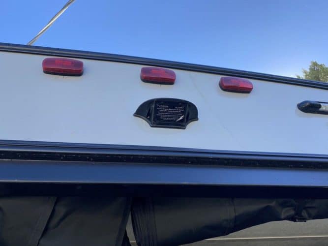 RV backup camera pre-wire kit on the back of a travel trailer