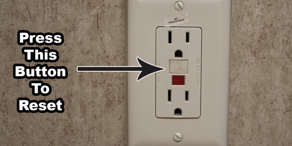 A GFCI RV outlet that needs to be reset in the bathroom of a travel trailer