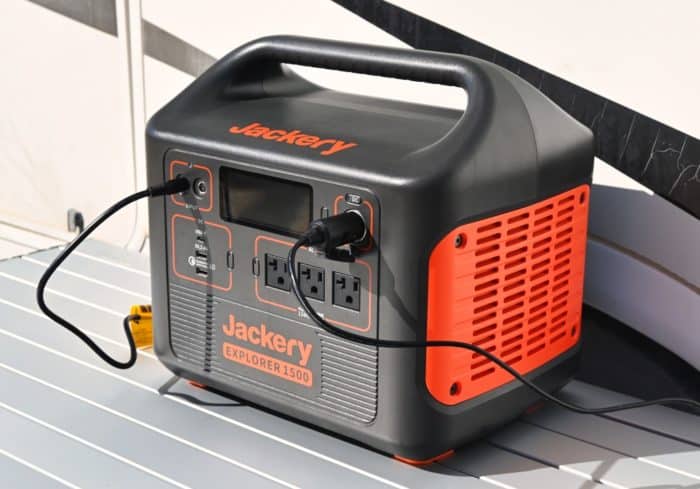 Jackery Explorer portable power station connected to a solar panel