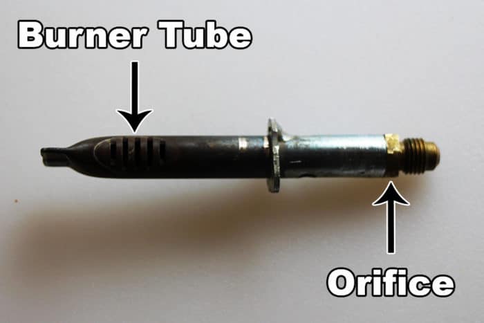 The Norcold burner assembly has a burner tube with the orifice screwed onto the end.
