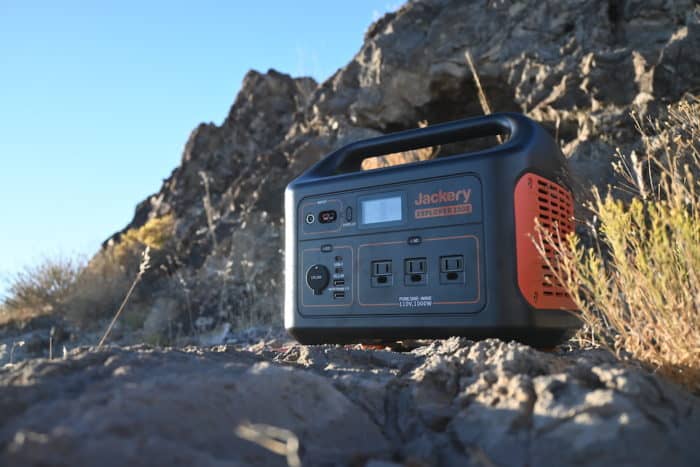 Jackery Explorer 1000 portable power station sitting on a rock