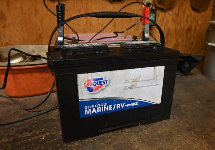 deep cycle marine rv battery being charged by a smart deep cycle battery charger