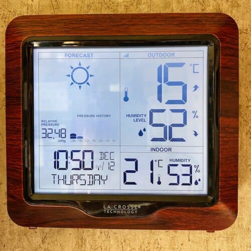 weather station inside an rv being used to monitor the humidity to stop condensation and mold growth