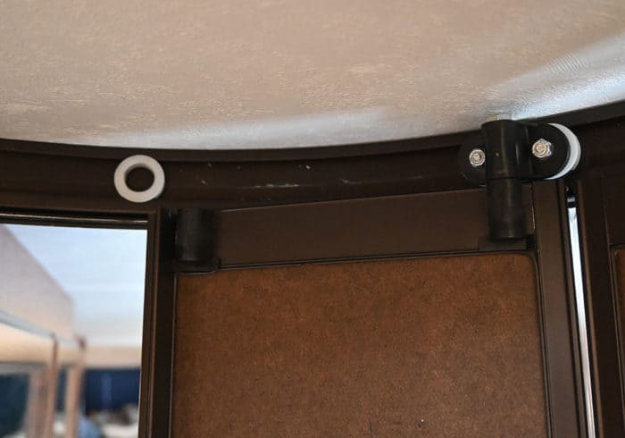 broken roller assembly on an RV sliding bathroom door