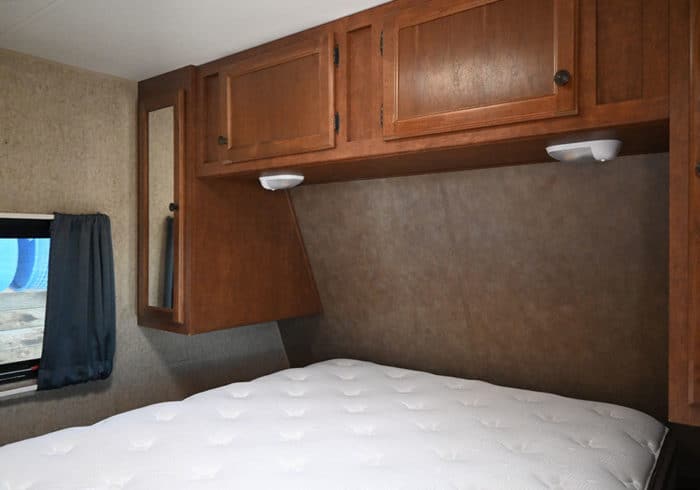 RV short queen mattress inside a travel trailer that requires special rv bedding
