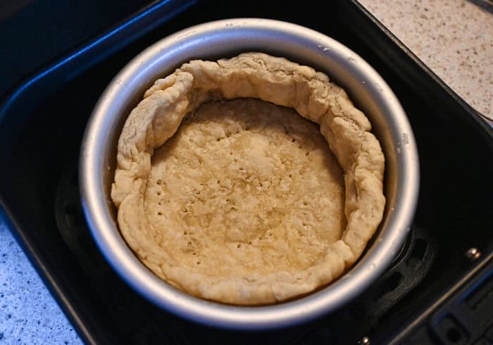 pie crust after being cooked inside a small air fryer