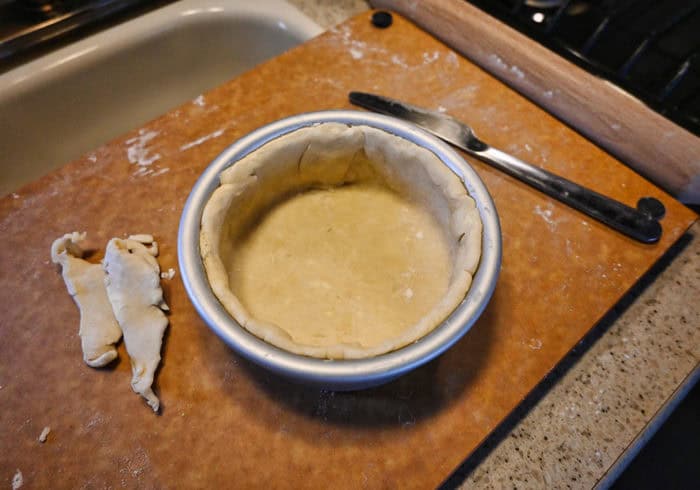 pie dough inside a small mini air fryer cake pan
