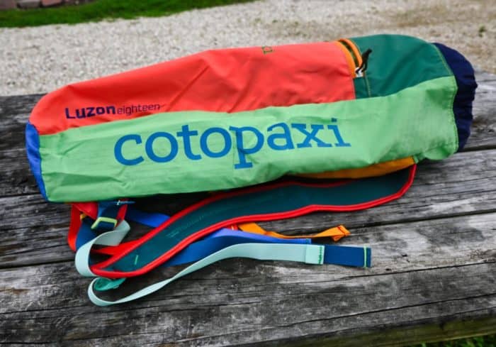 The Cotopaxi 18L Luzon Del Dia Daypack is more narrow at the bottm than at the top