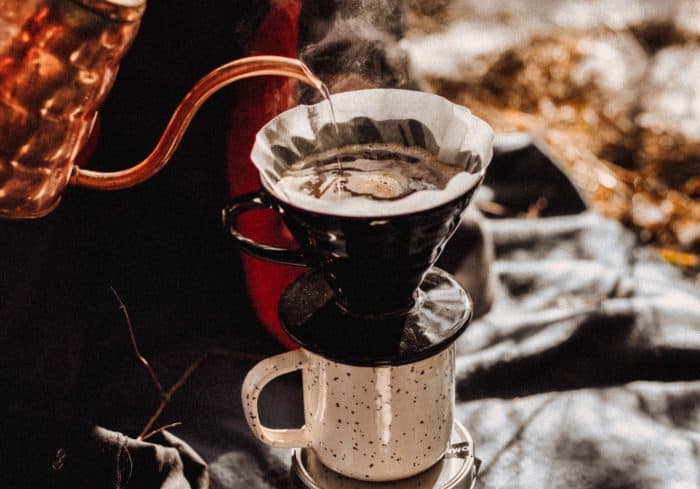 making coffee while camping using a drip coffee maker