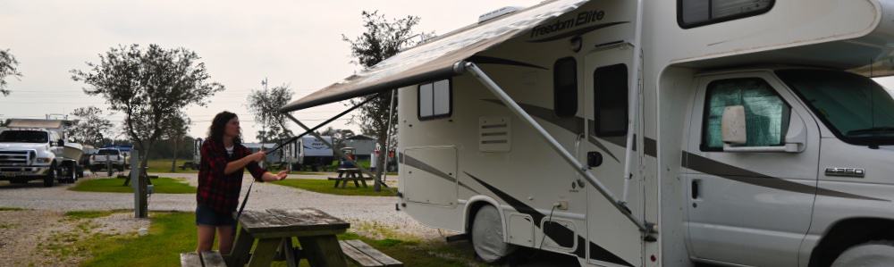 opening a manual rv awning on a class c motorhome
