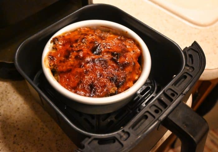 Fully cooked mini air fryer meatloaf with the sauce on top done using the small air fryer meatloaf recipe