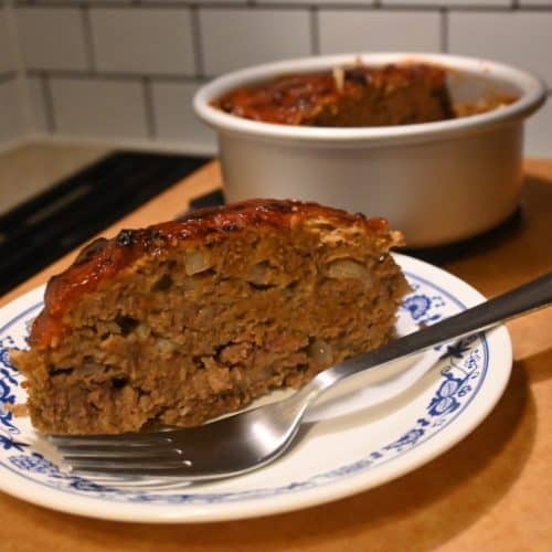 slice of meatloaf made in a mini air fryer using small air fryer meatloaf recipe