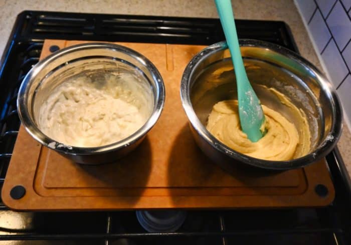 small air fryer banana bread recipe bowl with batter next to bowl with banana and sour cream