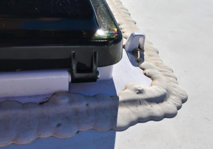 maxxair fan on a camper roof sealed with rv roof caulk dicor self leveling lap sealant