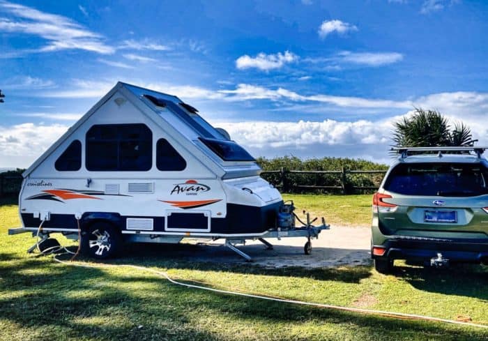 a frame pop up camper towable type of rv for small vehicles
