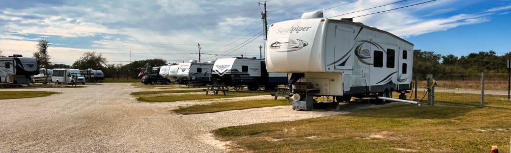 campers in an rv park using rv water softeners