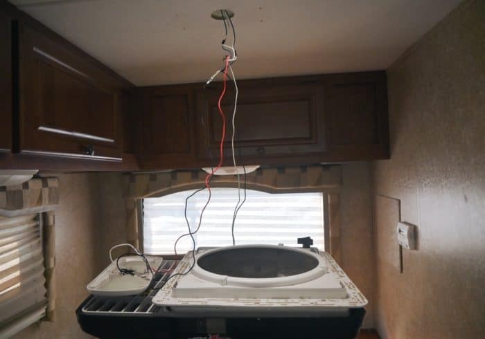 testing the 12 volt light cables to make sure they can power the rv fan before installation