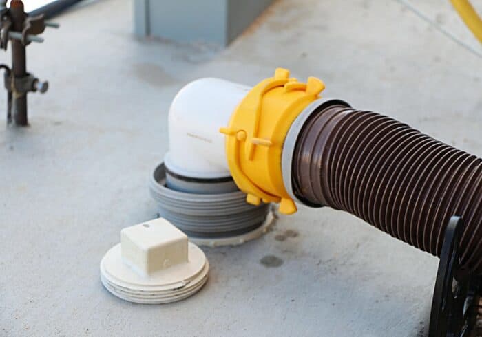 elbow fitting on a camco revolution RV sewer hose that can be hard to disconnect and requires a rv sewer hose fitting wrench