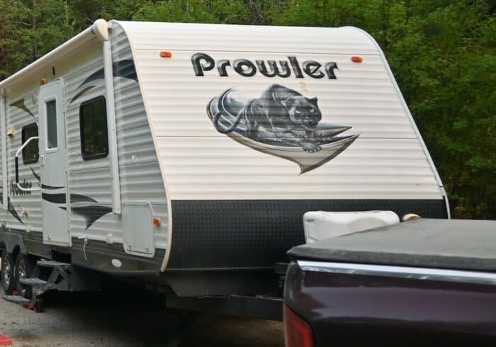 front rv decal graphic on a travel trailer that can be replaced with a custom rv decal