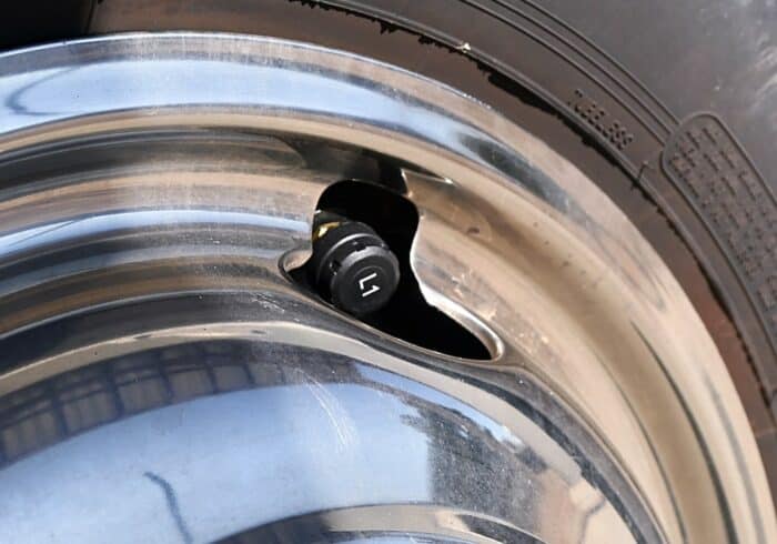 Tymate RV tire pressure monitoring system sensor on a motorhome tire