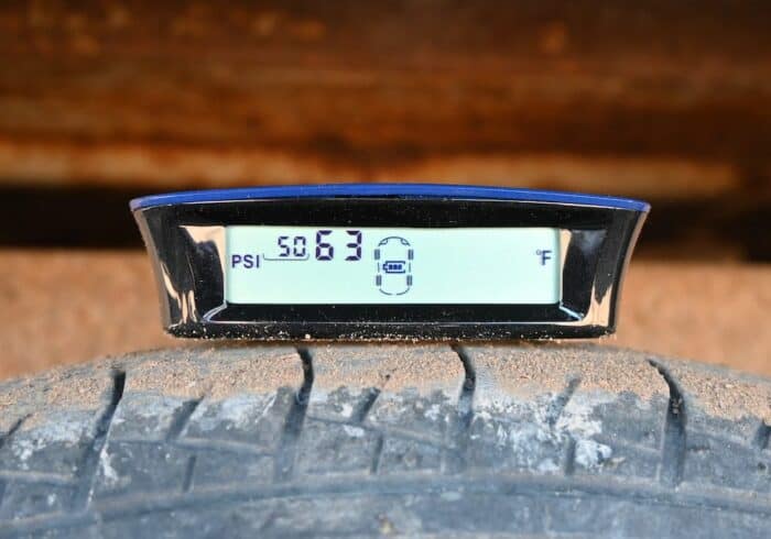 Tymate RV tire pressure monitoring system monitor showing the real time tire pressure and temperature