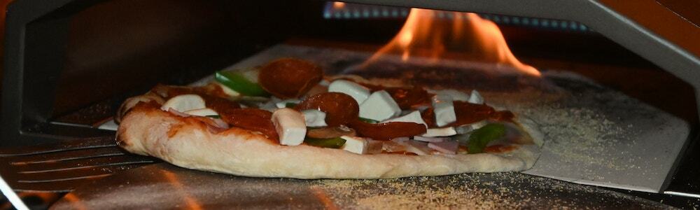 pizza being cooked in the vevor propane pizza oven