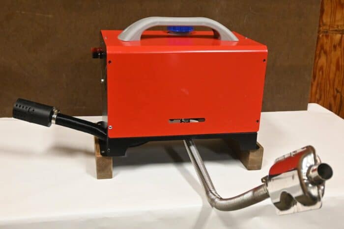 Portable diesel heater i built for roof, hot air pipe goes into