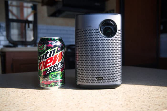 Soda can next to the Halo Plus projector