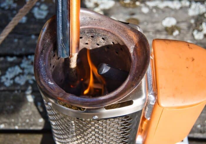 using a prepared4x fire starter survival torch to light a biolite camp stove