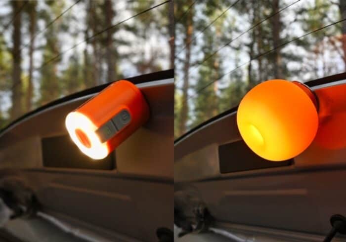 Flextail Tiny Pump 2X being used as a lantern and magnetically stuck to the frame of a car