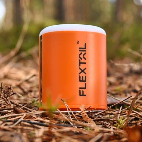 Flextail Tiny Pump 2X being used while camping to inflate air mattresses 