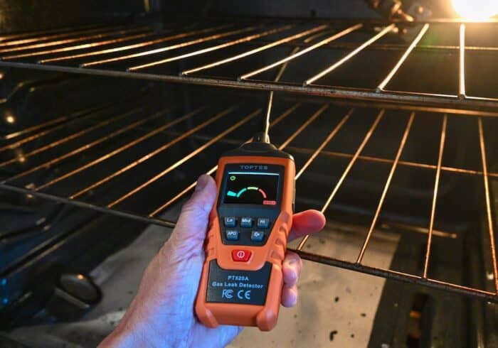 using a gooseneck toptes gas detector to check for gas leaks inside a natural gas powered oven