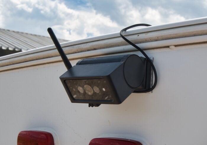 Auto Vox solar RV backup camera mounted to the back of a 5th-wheel RV trailer