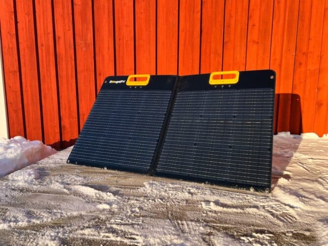bougerv solar panel on a snowy deck