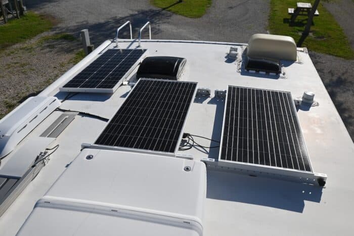 three solar panels on rv roof