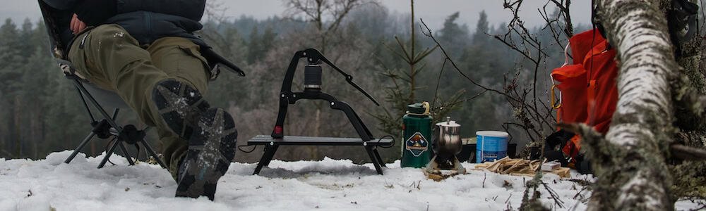 flair go non-electric manual espresso maker being used on a backpack camping trip