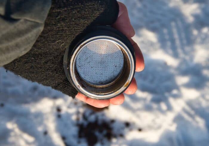 grounds attachment on the conqueco battery powered espresso machine after knocking out used grounds