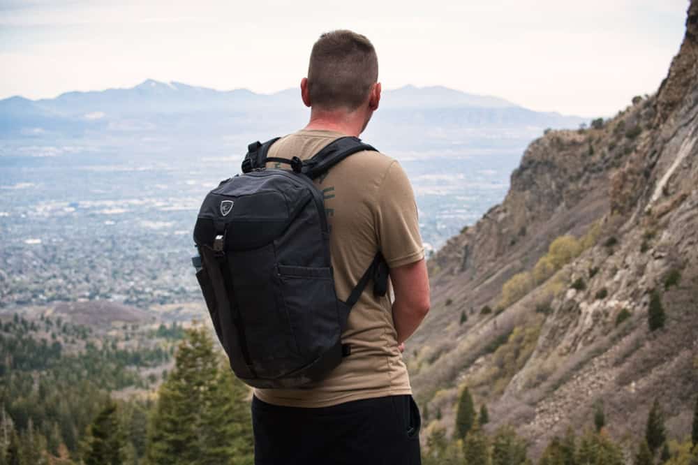 Jesse wearing the Kuhl Eskape 20 Kanvas backpack on the trail